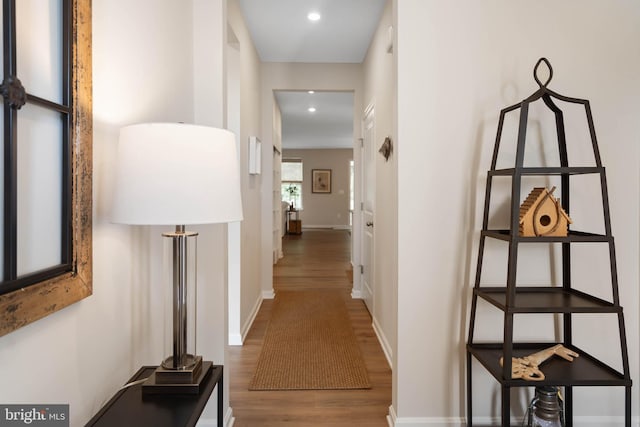 hallway featuring hardwood / wood-style flooring