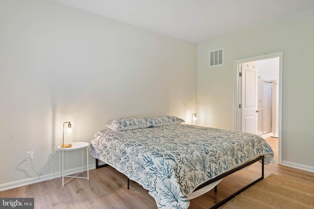 bedroom featuring light hardwood / wood-style flooring