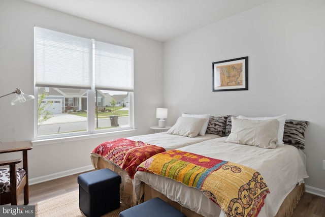 bedroom with wood-type flooring