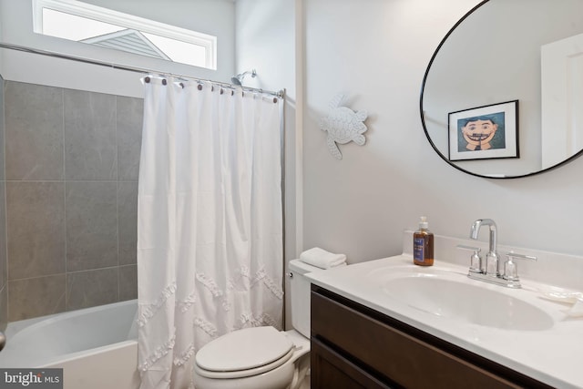 full bathroom with toilet, vanity, and shower / bath combination with curtain