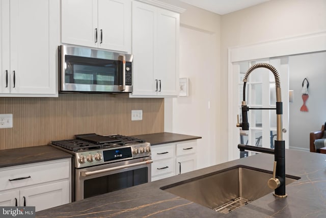 kitchen with white cabinets and stainless steel appliances