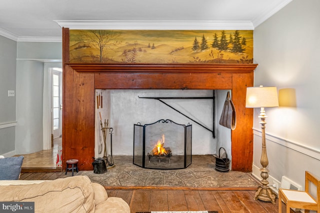 interior details featuring ornamental molding and hardwood / wood-style flooring