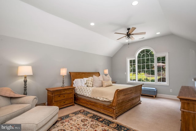 carpeted bedroom featuring ceiling fan and lofted ceiling