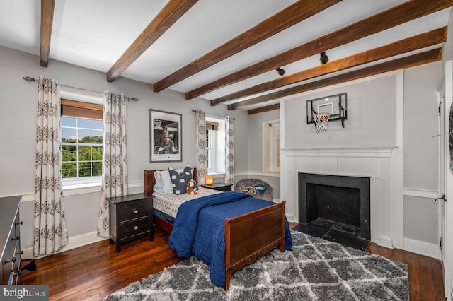 bedroom with dark wood-type flooring and beamed ceiling