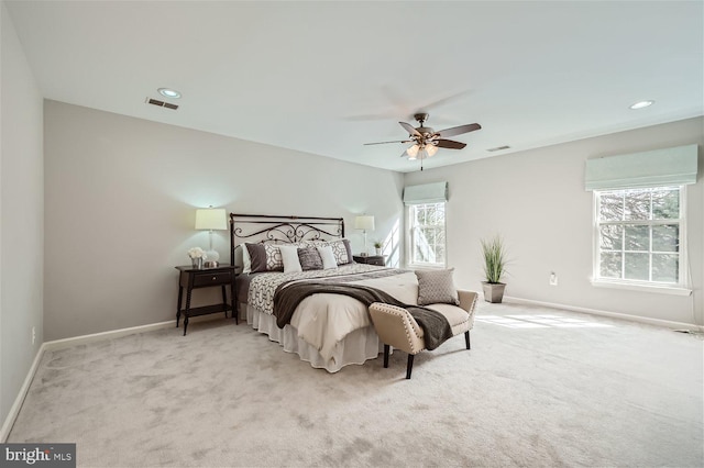 carpeted bedroom with ceiling fan