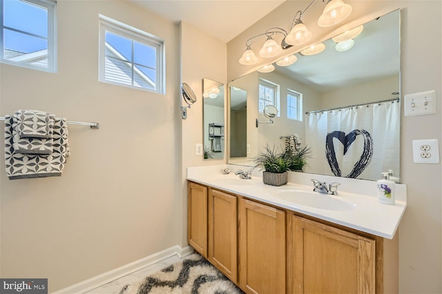 bathroom featuring vanity and walk in shower