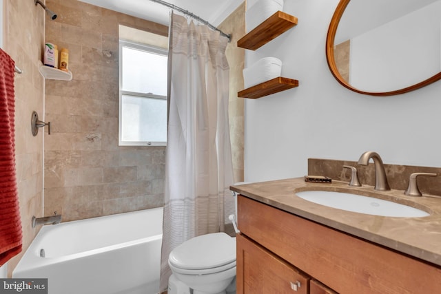 full bathroom featuring vanity, toilet, and shower / bath combo with shower curtain