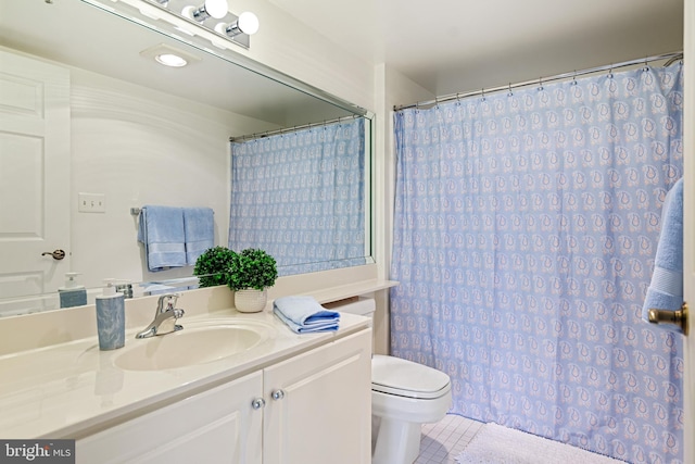 full bath with toilet, curtained shower, tile patterned flooring, and vanity