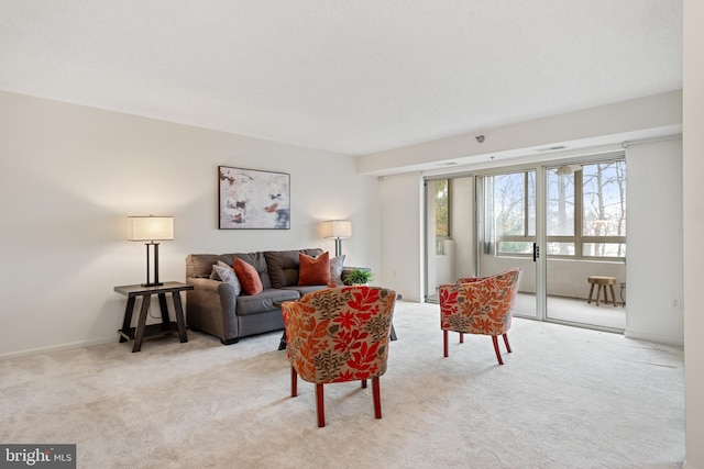 living room with light colored carpet