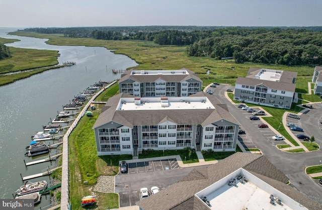 drone / aerial view with a water view