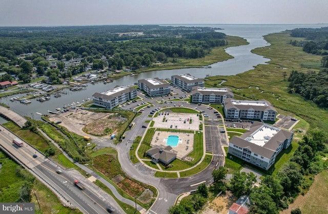 birds eye view of property featuring a water view