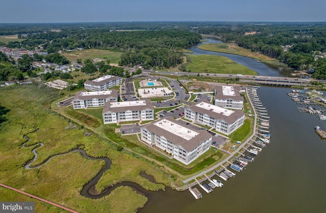 birds eye view of property featuring a water view