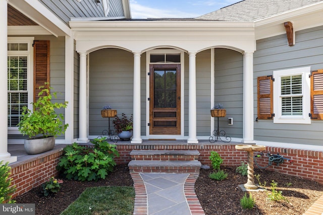 property entrance featuring covered porch