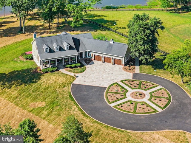 birds eye view of property featuring a rural view