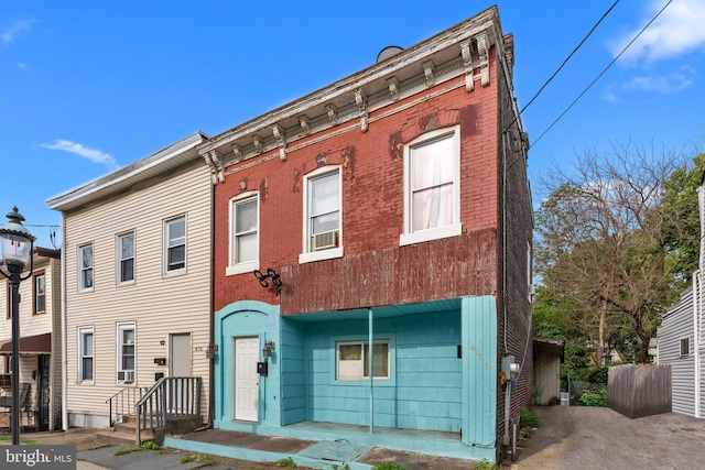 view of front of home with brick siding