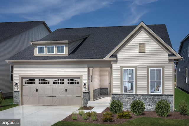 view of front of home with a garage