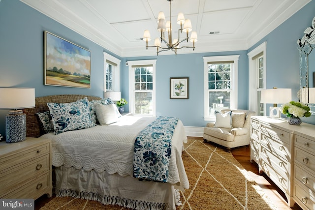 bedroom featuring crown molding, multiple windows, dark wood-type flooring, and an inviting chandelier