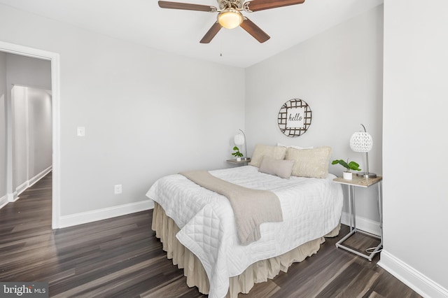 bedroom featuring ceiling fan and dark wood-type flooring