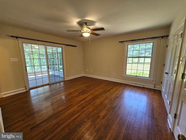 unfurnished room featuring a baseboard heating unit, ceiling fan, and dark hardwood / wood-style floors