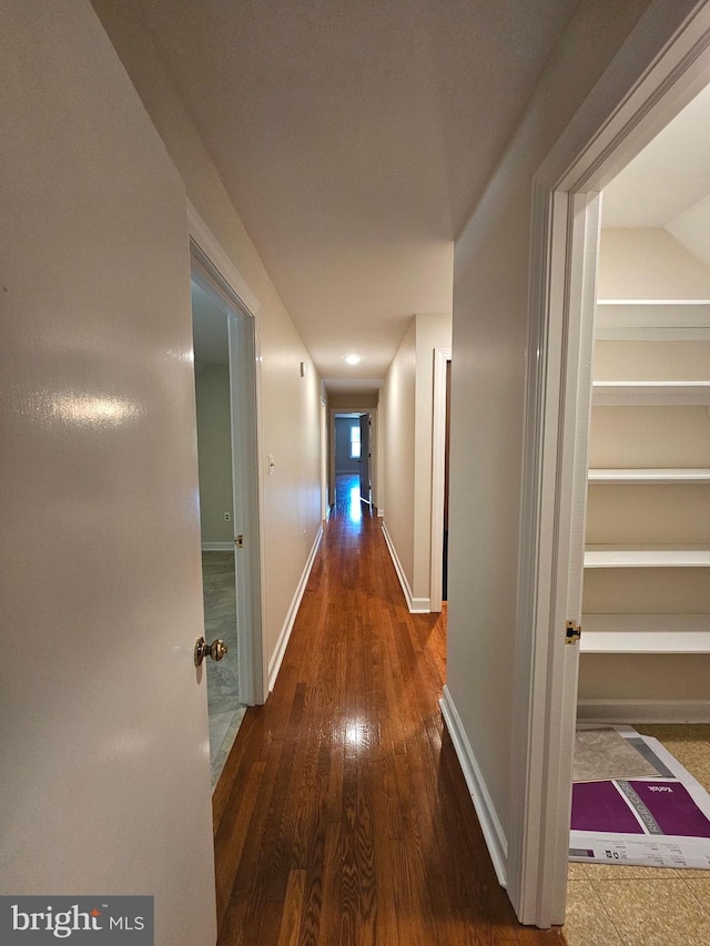 hall featuring dark hardwood / wood-style floors