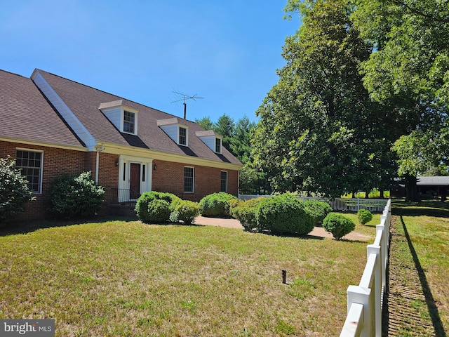 view of front of property with a front lawn