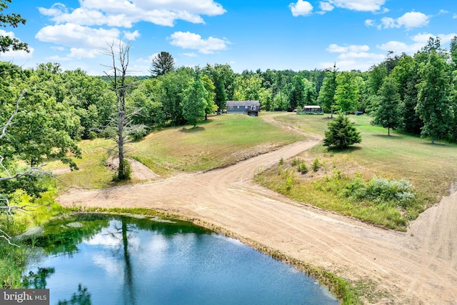 drone / aerial view featuring a water view