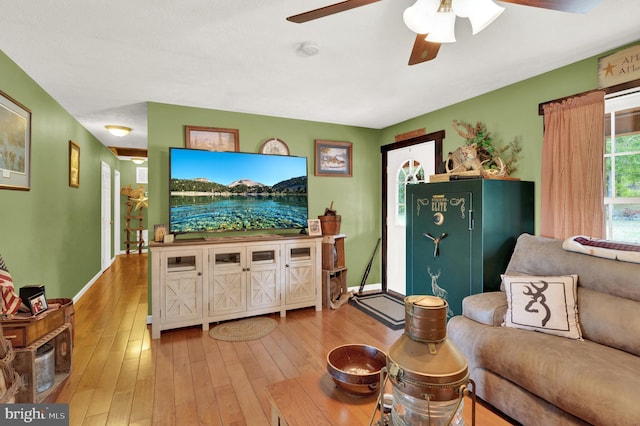 living room with light hardwood / wood-style flooring