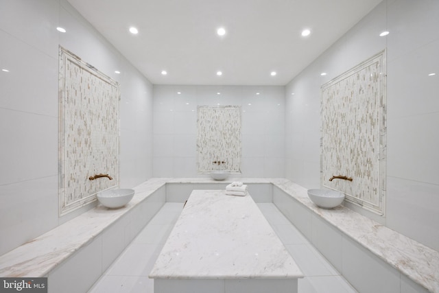 bathroom with tile patterned floors