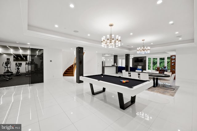 rec room with light tile patterned floors, a raised ceiling, a notable chandelier, and billiards