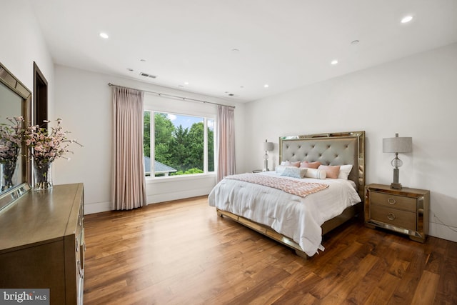 bedroom featuring hardwood / wood-style flooring