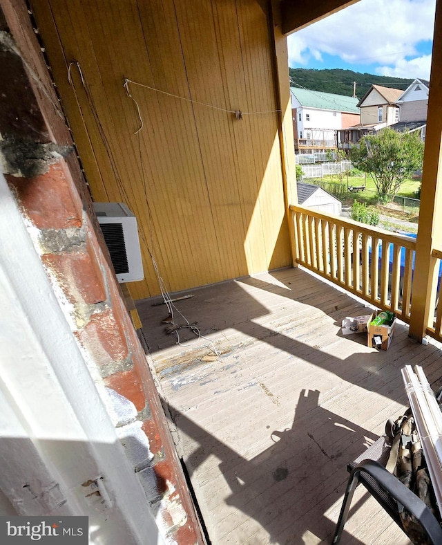 wooden terrace featuring heating unit