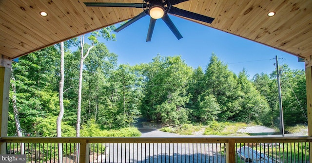 wooden deck with ceiling fan