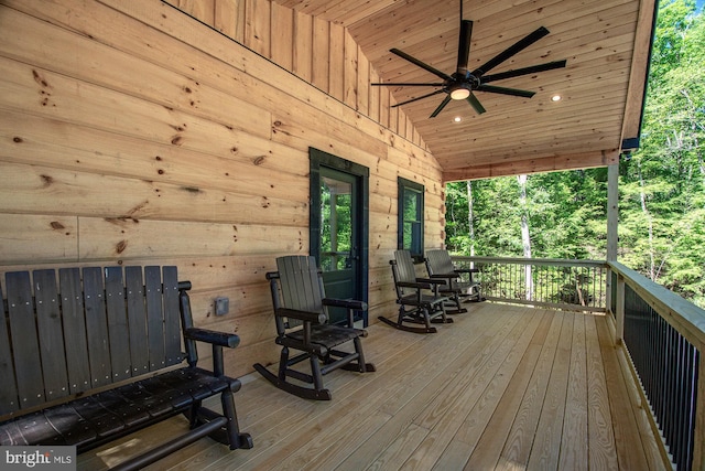 wooden terrace featuring ceiling fan