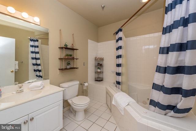 full bathroom featuring toilet, shower / bath combination with curtain, vanity, and tile patterned floors