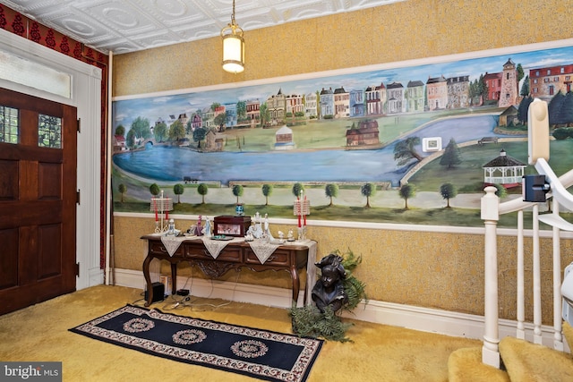 entryway with carpet floors