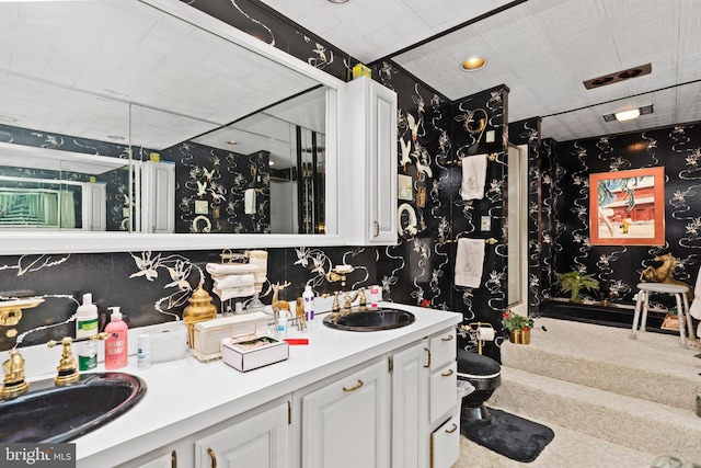 bathroom with vanity and toilet