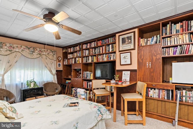 bedroom featuring ceiling fan and light colored carpet