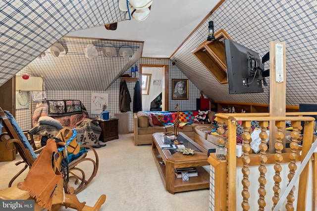 interior space featuring lofted ceiling, crown molding, and carpet floors