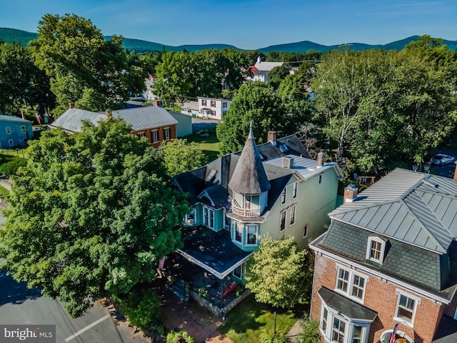 drone / aerial view featuring a mountain view