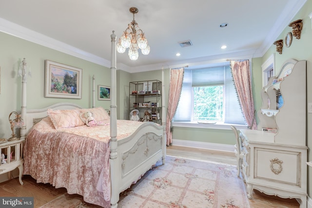 bedroom featuring crown molding, light hardwood / wood-style flooring, and an inviting chandelier