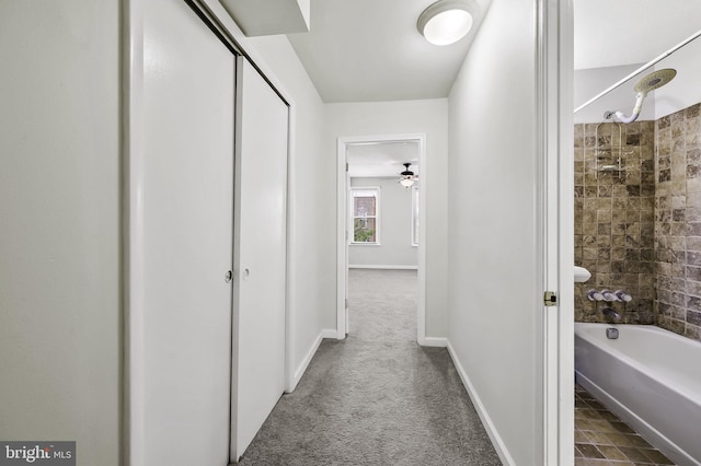 corridor with carpet floors