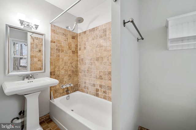 bathroom featuring sink and tub / shower combination