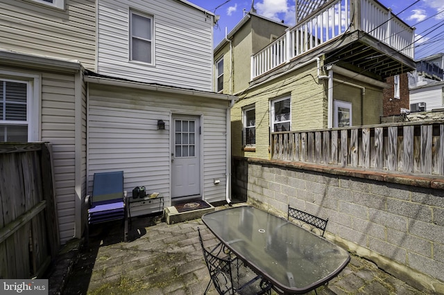 view of patio / terrace with a balcony