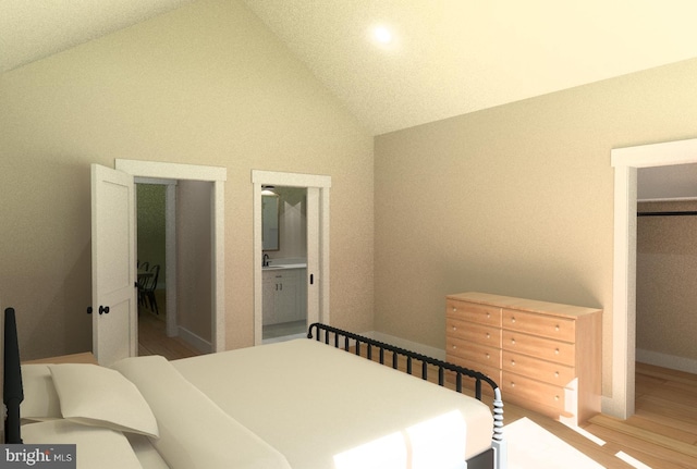 bedroom featuring ensuite bath, high vaulted ceiling, and hardwood / wood-style flooring