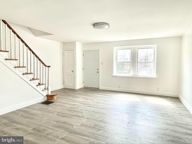 foyer entrance featuring light hardwood / wood-style floors