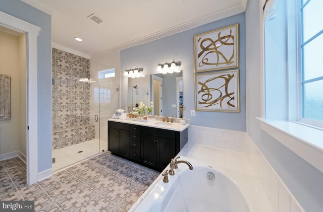 bathroom with plus walk in shower, vanity, tile patterned floors, and crown molding