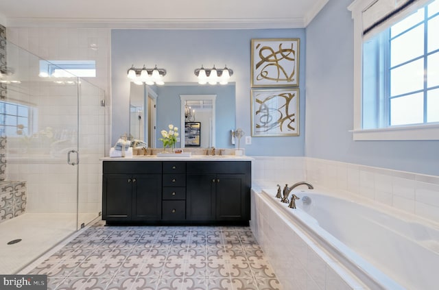 bathroom featuring tile patterned floors, vanity, plus walk in shower, and ornamental molding