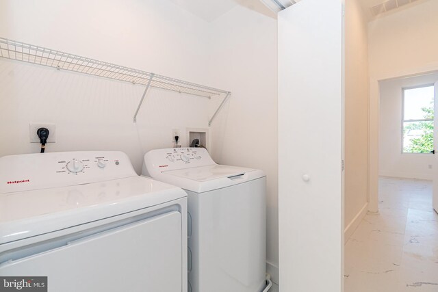 laundry area with washer and clothes dryer