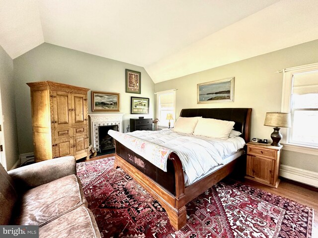 1308 Great Rd, Princeton, NJ 08540 - bedroom with lofted ceiling, wood finished floors, baseboards, and a fireplace