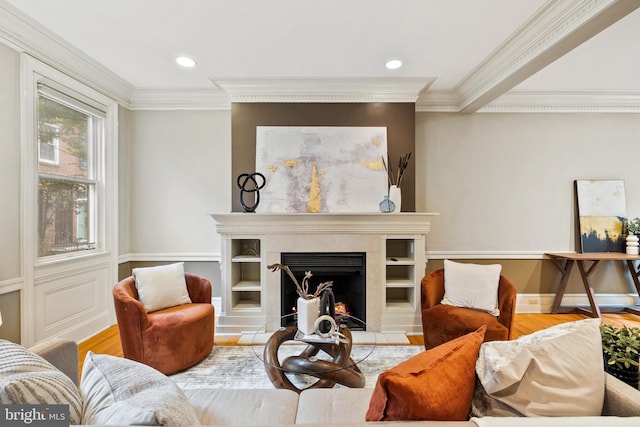 living room featuring light wood-type flooring and crown molding